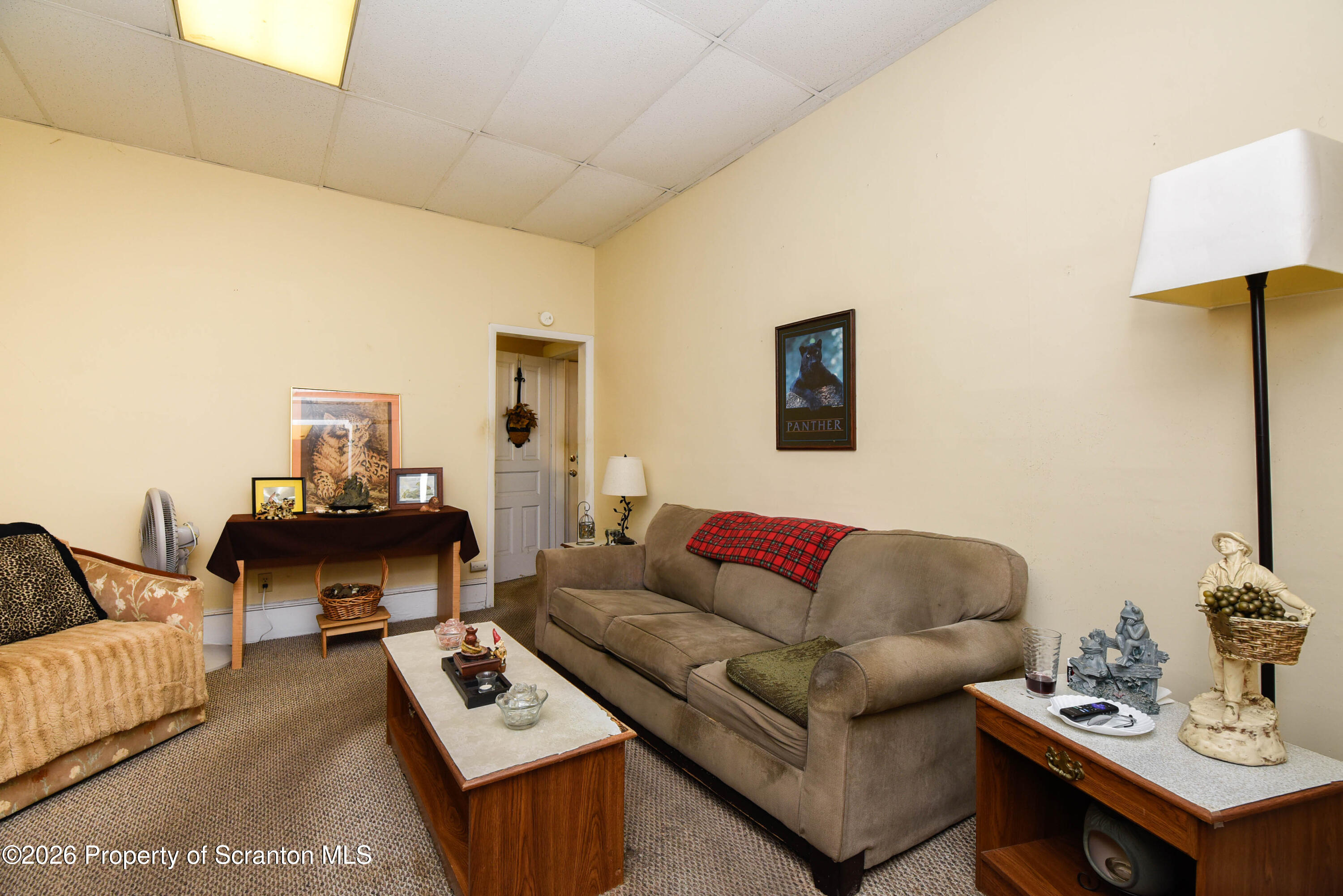 520 Main Street Archbald, PA 18403 - Photo 12 of 47 a living room with furniture and a couch
