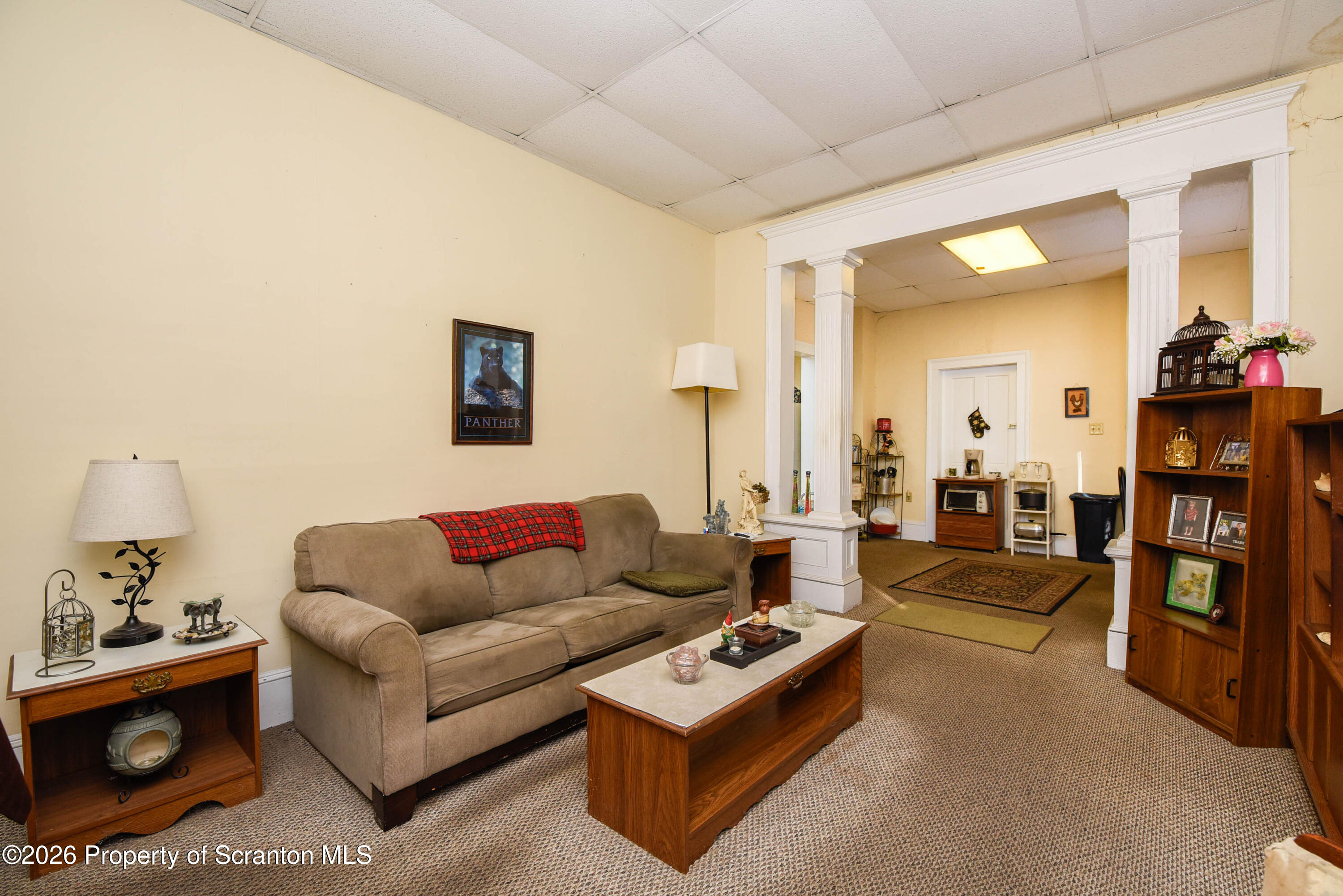 520 Main Street Archbald, PA 18403 - Photo 14 of 47 a living room with furniture and a table