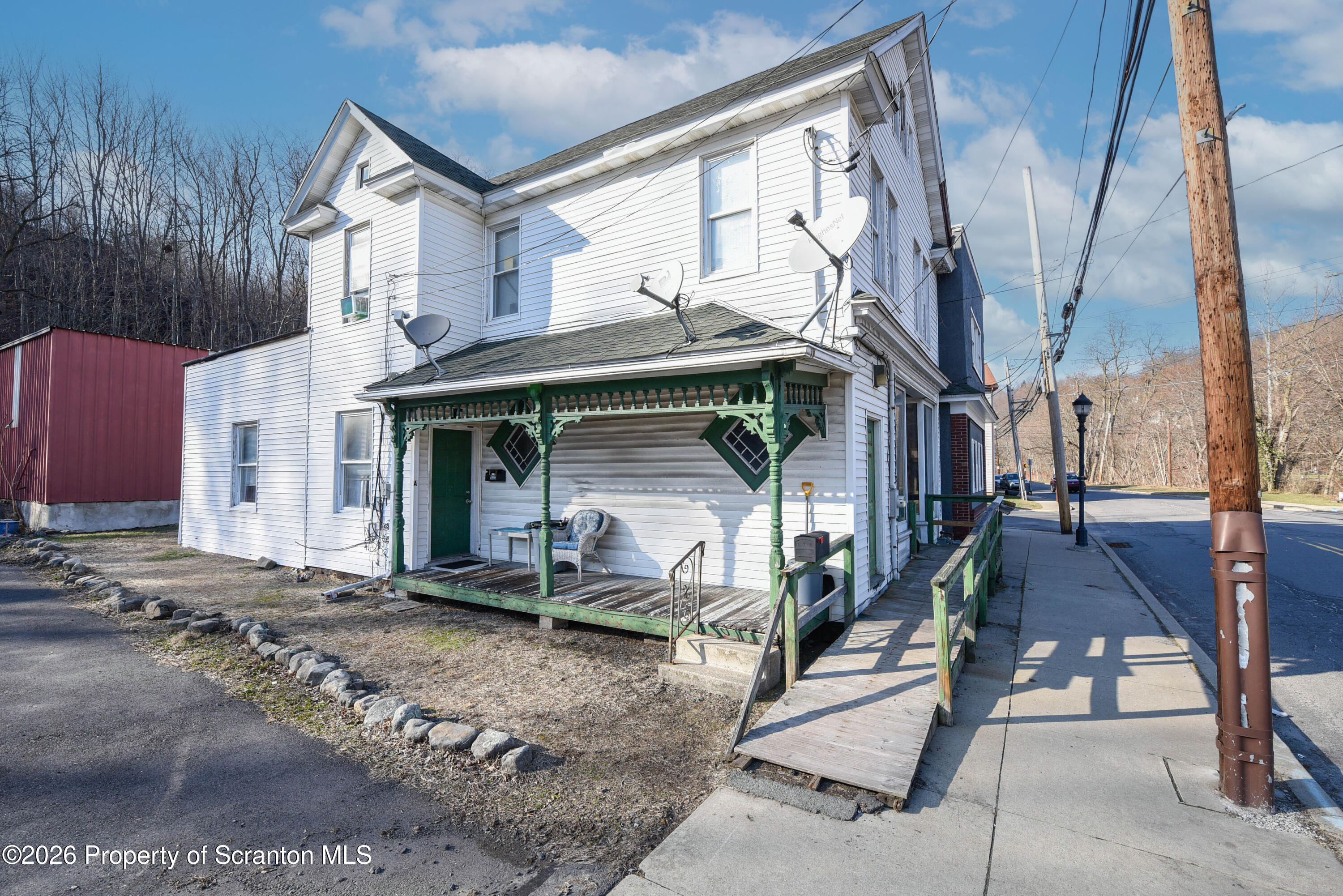 520 Main Street Archbald, PA 18403 - Photo 2 of 47 a view of a house with a patio
