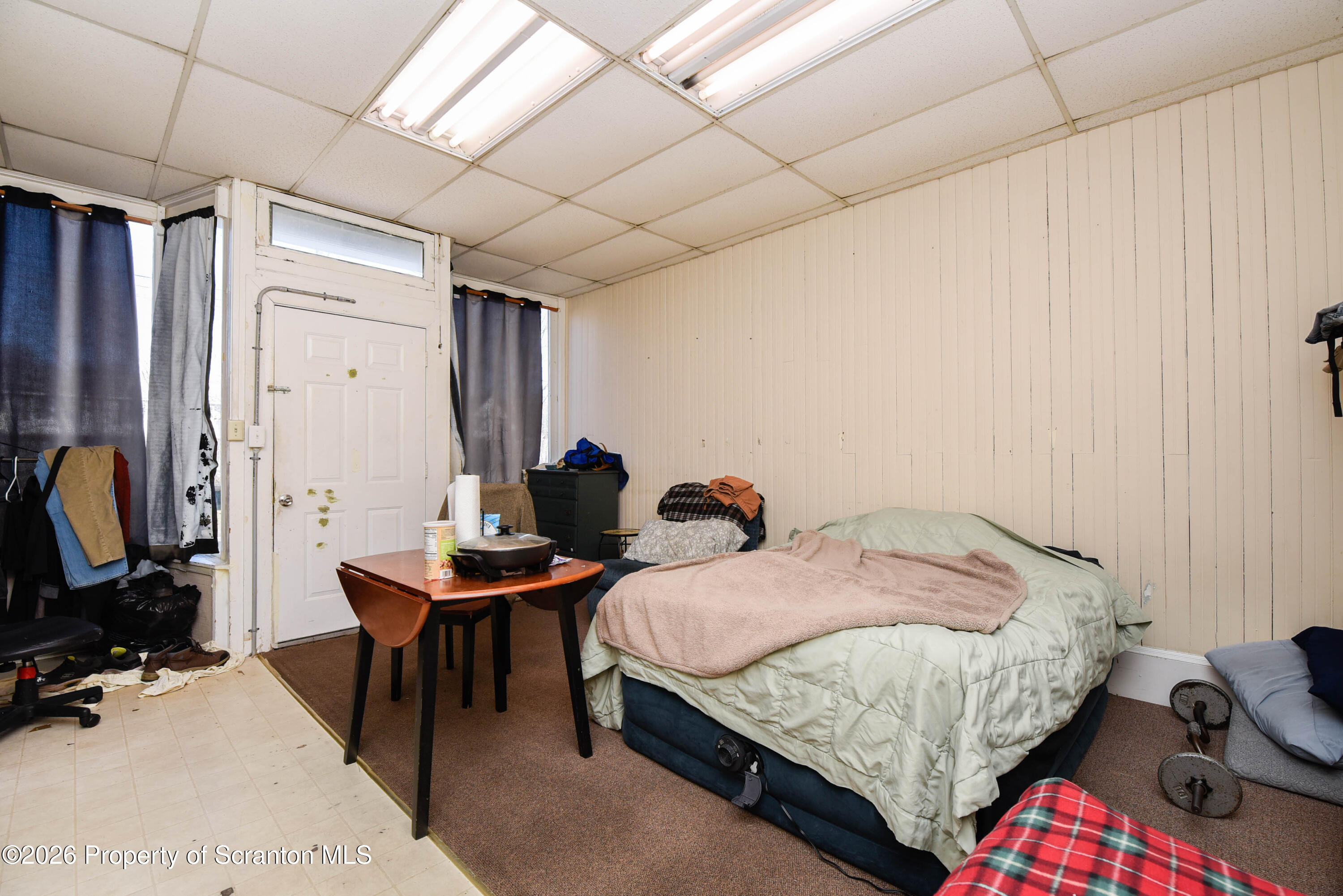 520 Main Street Archbald, PA 18403 - Photo 31 of 47 a bedroom with bed and a window