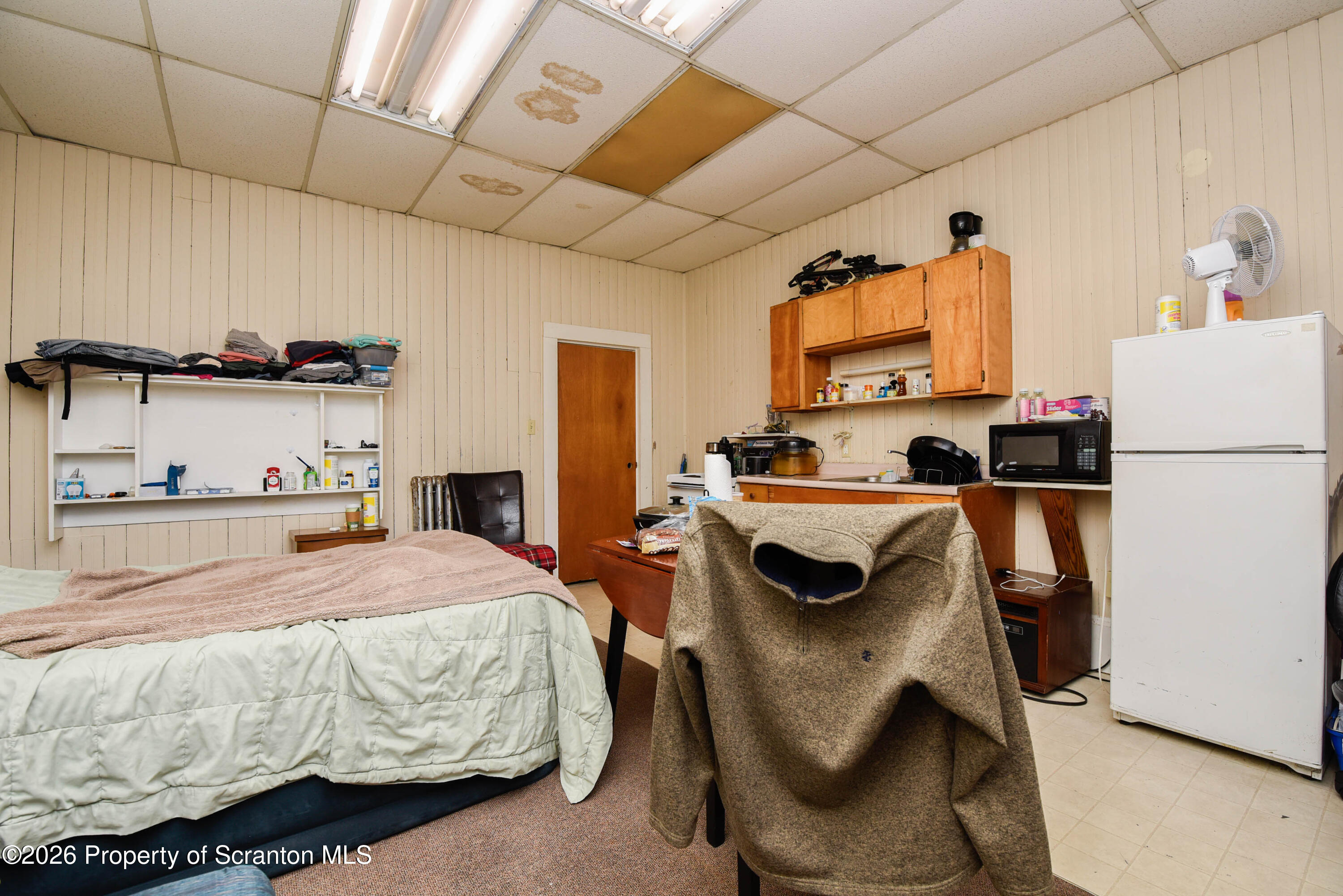 520 Main Street Archbald, PA 18403 - Photo 32 of 47 a bedroom with bed and a window
