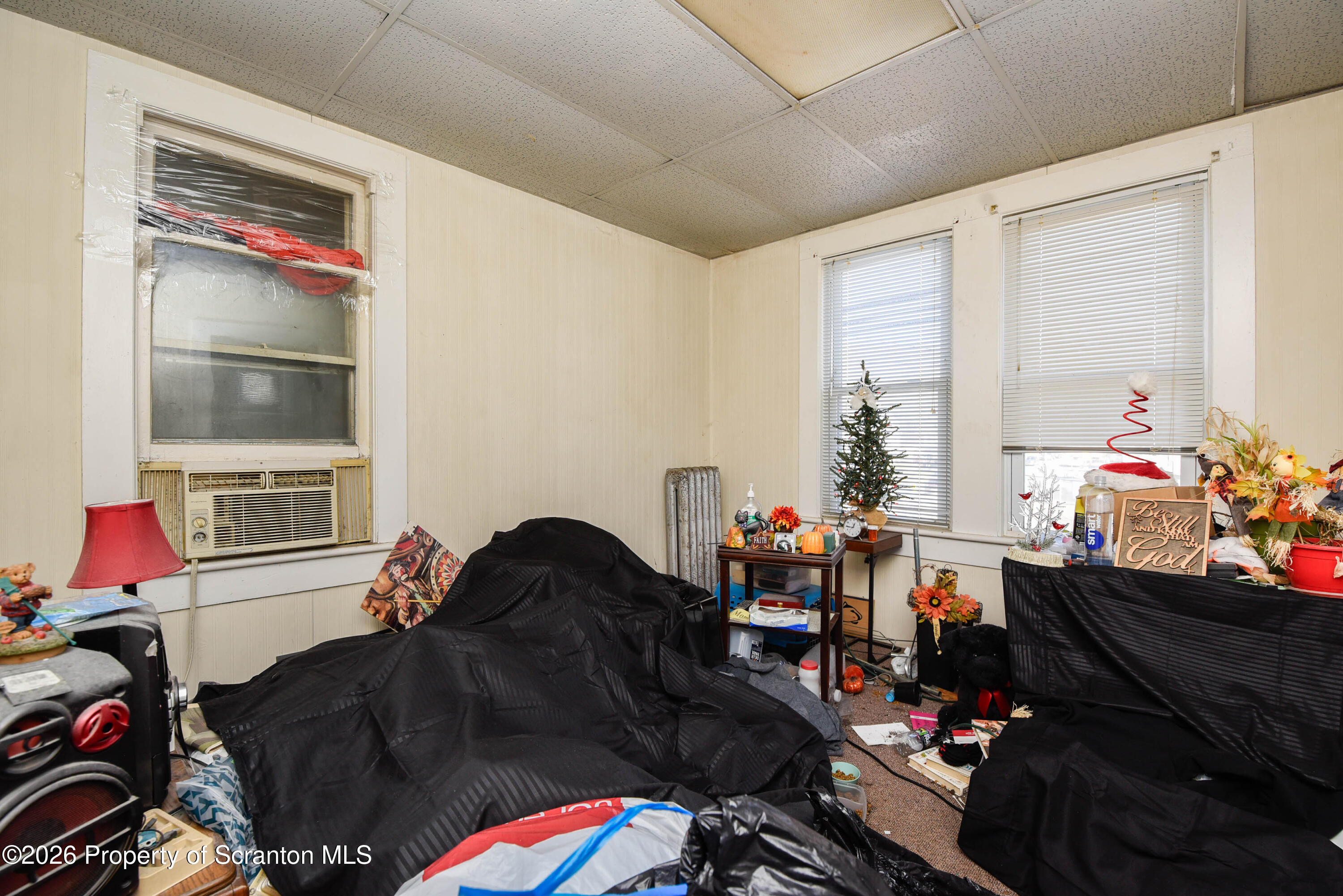 520 Main Street Archbald, PA 18403 - Photo 40 of 47 a living room filled with furniture and a window