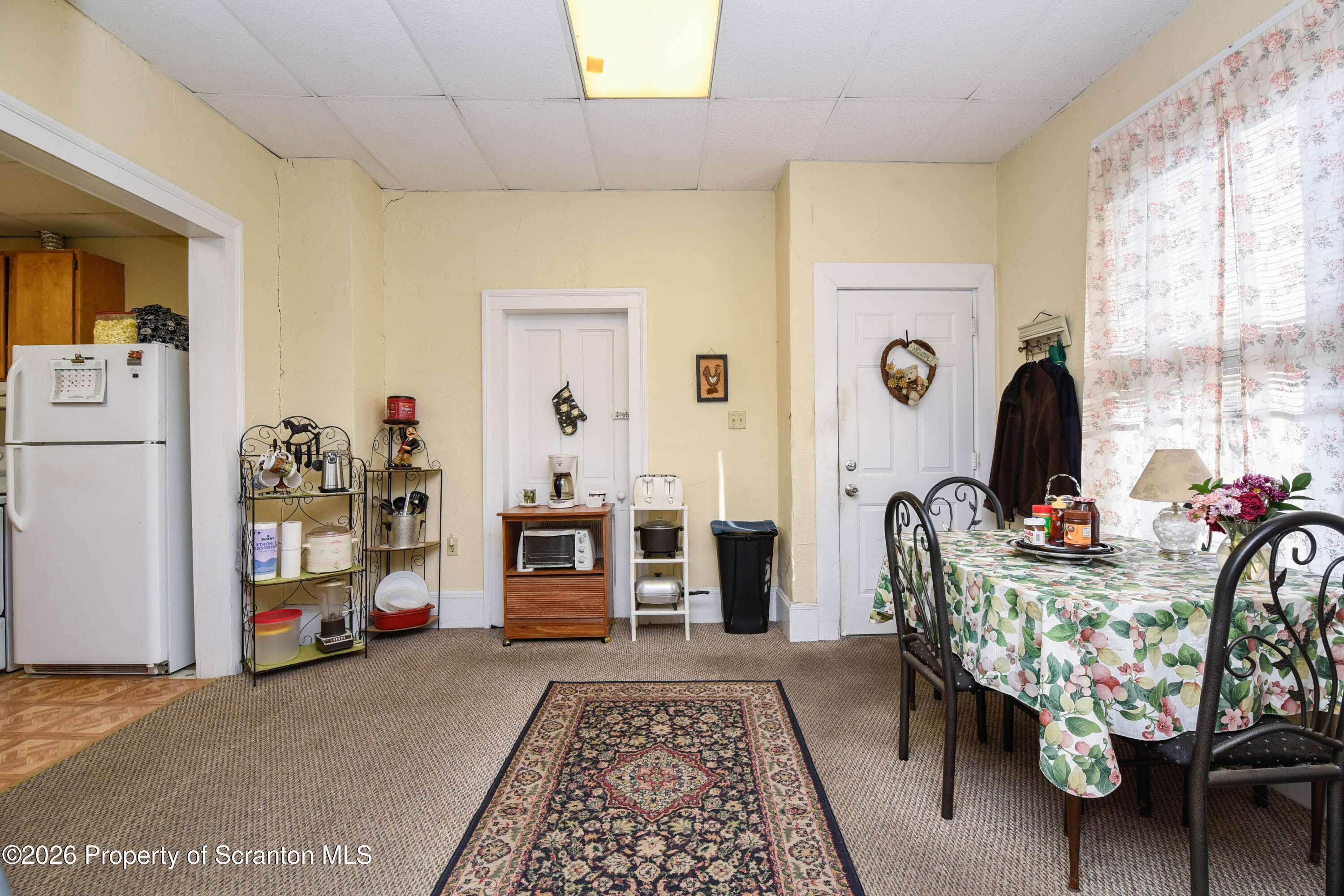 520 Main Street Archbald, PA 18403 - Photo 6 of 47 a living room with furniture and a window