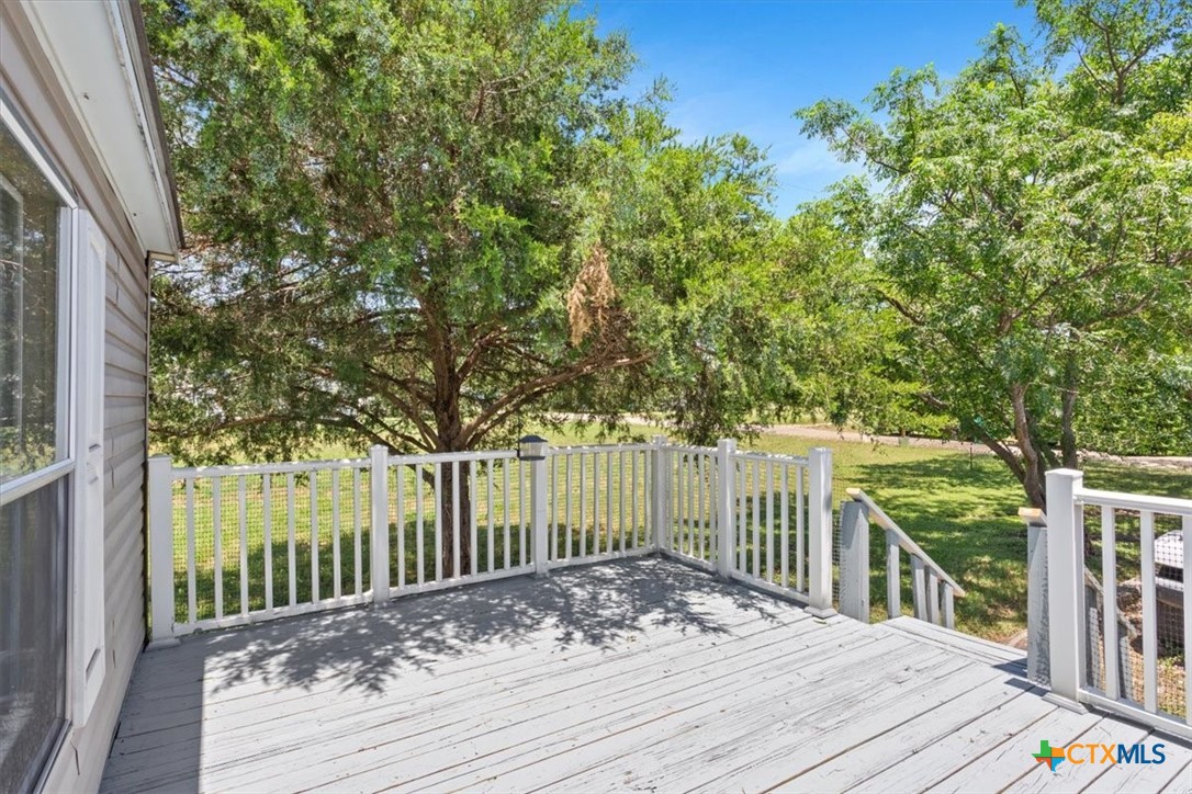 216 Moore Street Rogers, TX 76569 - Photo 23 of 29 a view of a house with a small yard