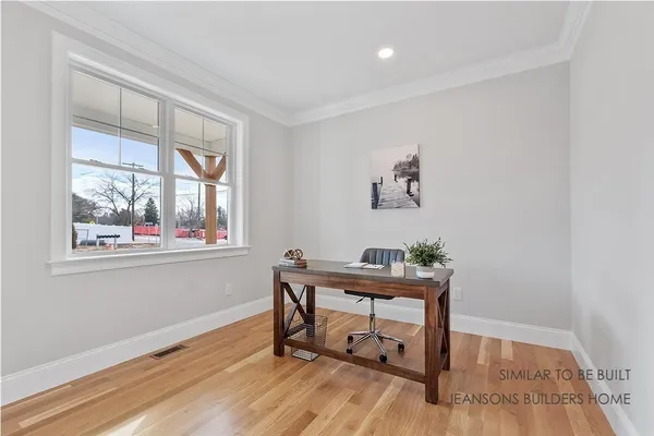 a living room with furniture a window and a fireplace