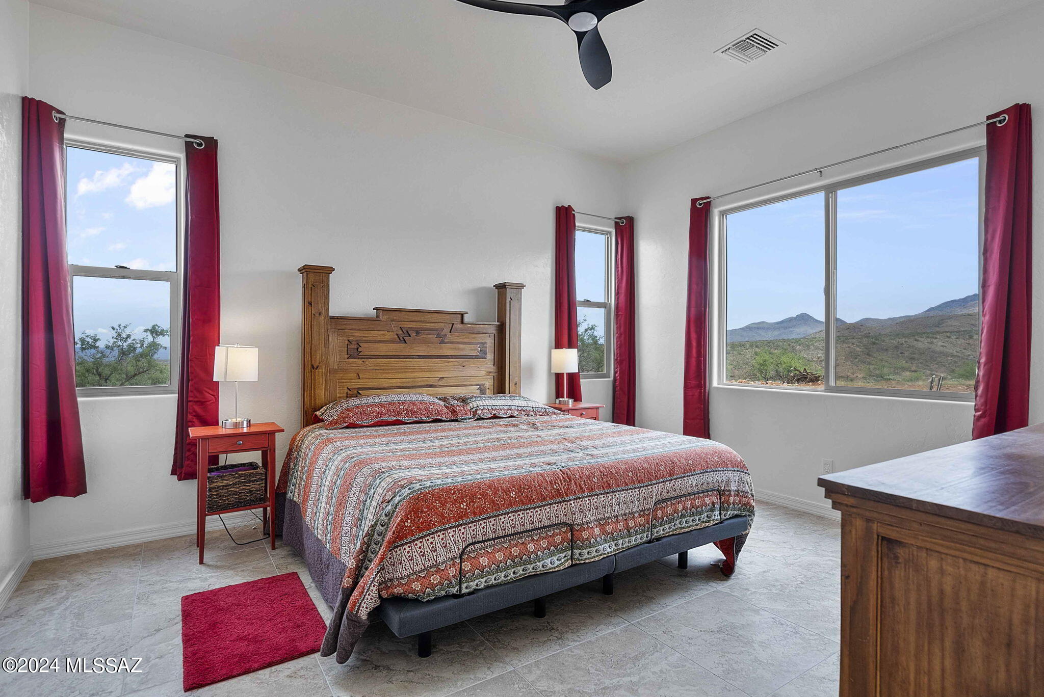 22 Vigas Lane Rio Rico, AZ 85648 - Photo 3 of 40 a bedroom with a bed and window