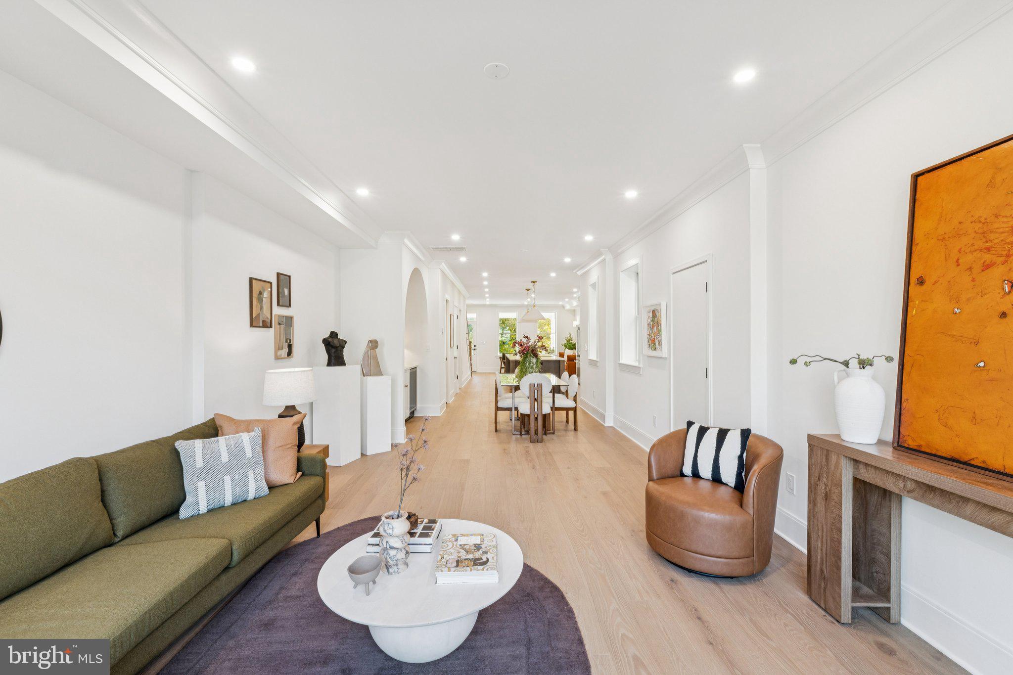 21 W Street Northwest Washington, DC 20001 - Photo 19 of 56 a living room with furniture and a wooden floor