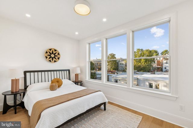a bathroom with a sink toilet tub and shower