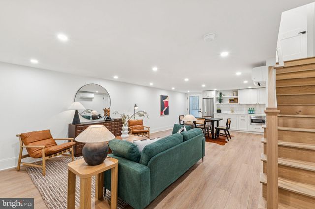 a bedroom with a bed and a mirror