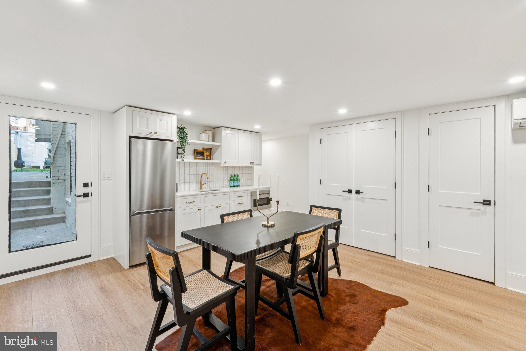 21 W Street Northwest Washington, DC 20001 - Photo 39 of 56 Basement dining room and the 2nd door to the back