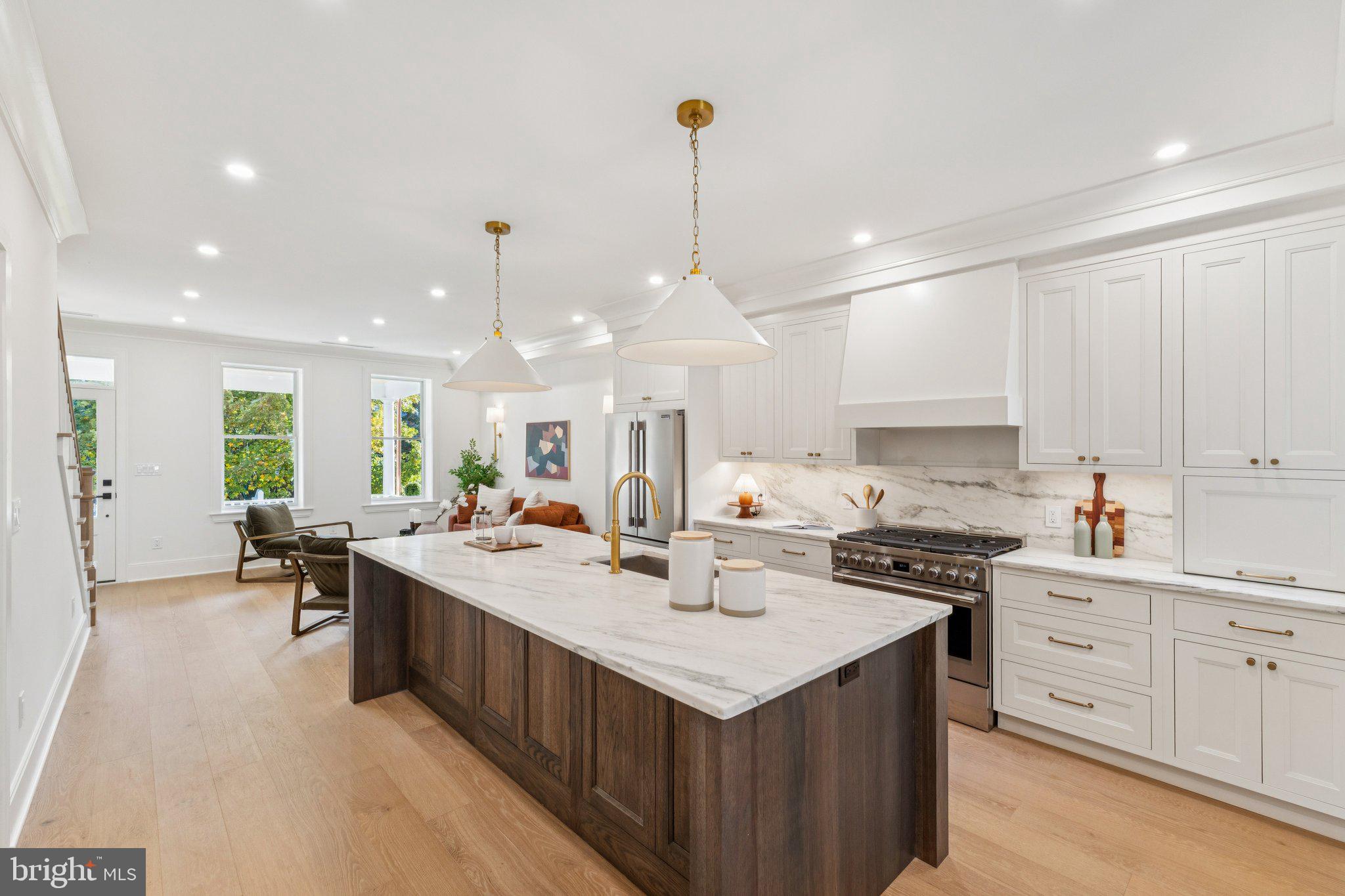 21 W Street Northwest Washington, DC 20001 - Photo 8 of 56 Kitchen island and living room