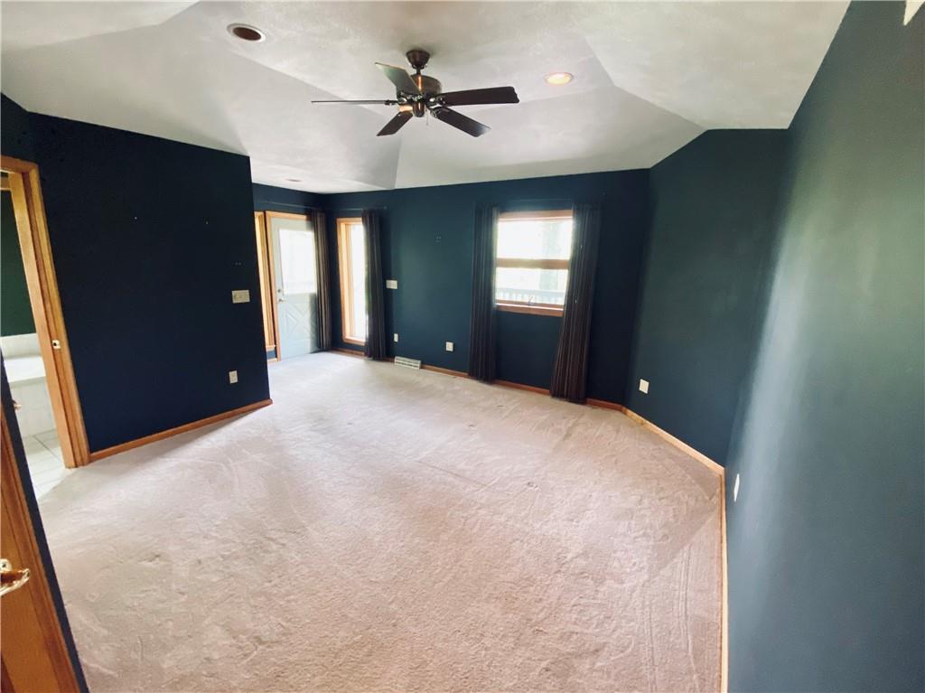 201 Curfew Road Perryopolis, PA 15473 - Photo 15 of 25 a view of a livingroom with a chandelier fan and windows