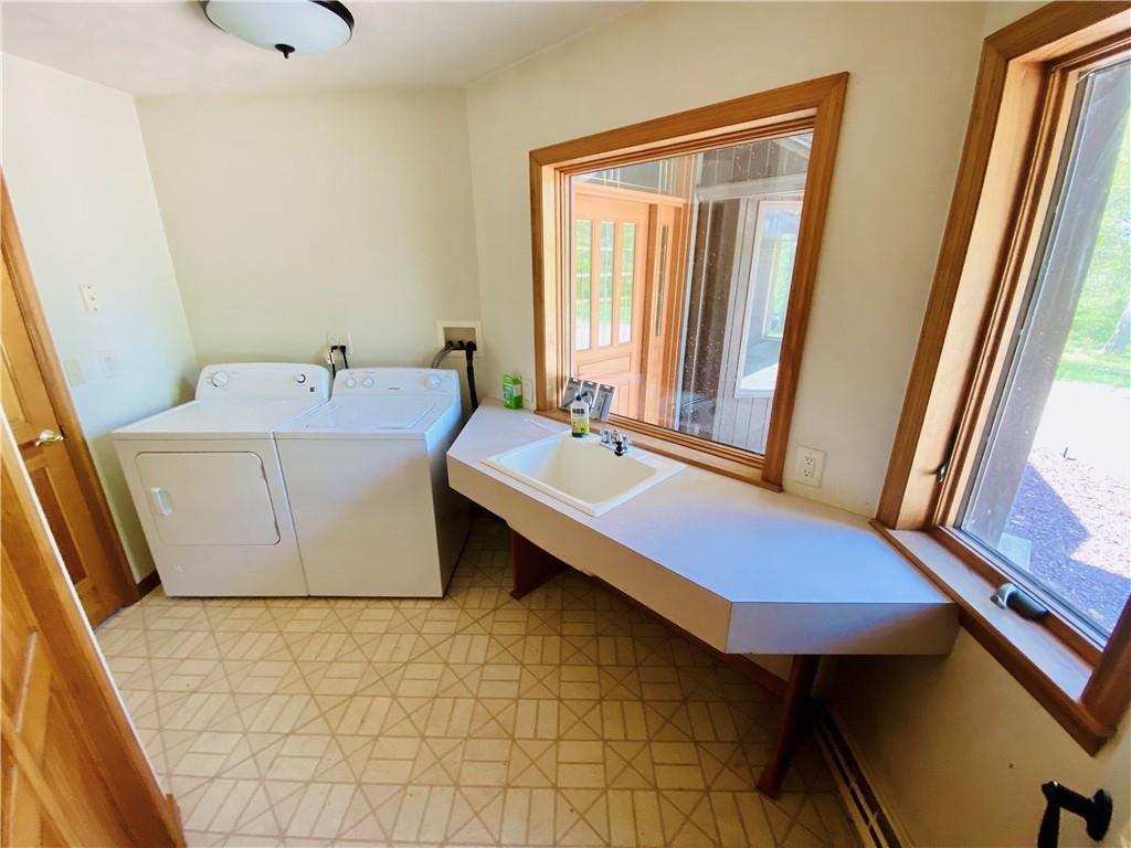 201 Curfew Road Perryopolis, PA 15473 - Photo 22 of 25 a spacious bathroom with a tub sink and a mirror