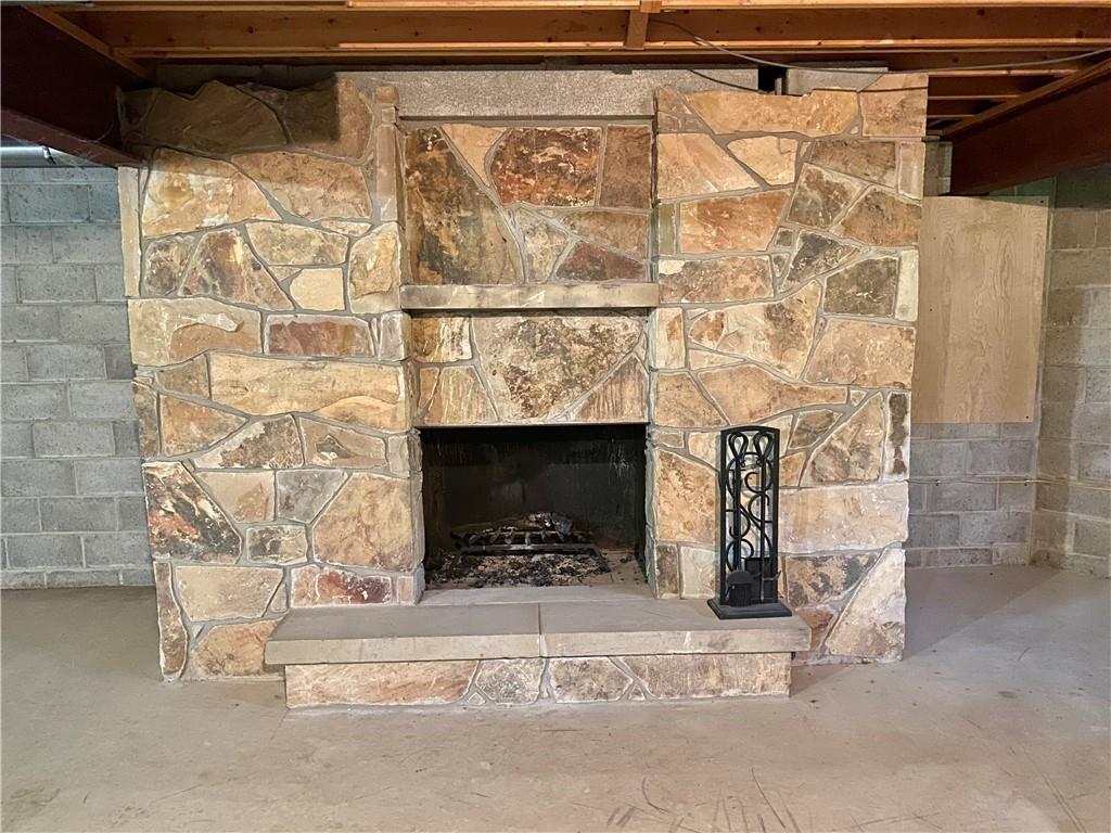 201 Curfew Road Perryopolis, PA 15473 - Photo 24 of 25 a living room with a fireplace