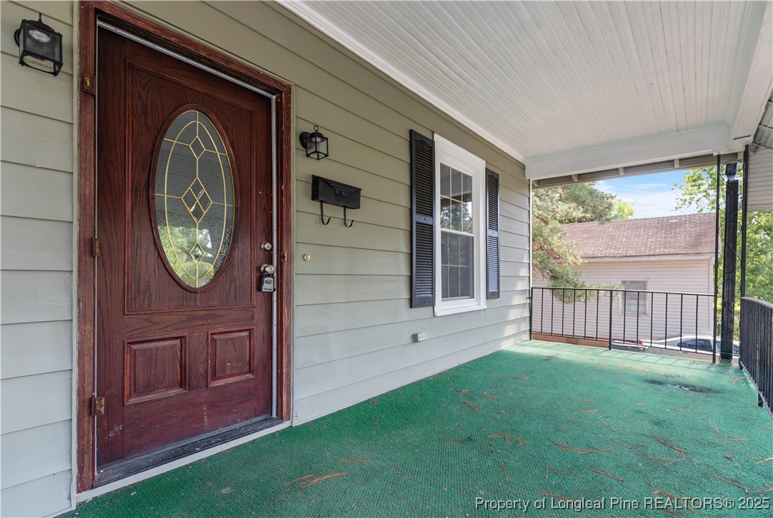 726 West M Street Erwin, NC 28339 - Photo 23 of 24 a view of a front door of house