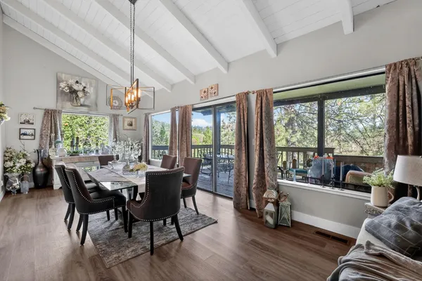 a kitchen with lots of counter top space and wooden floor