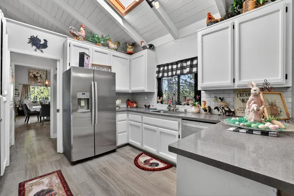 a view of a livingroom with furniture chandelier