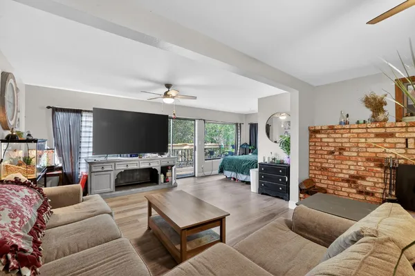 a bathroom with double vanity sinks and a mirror