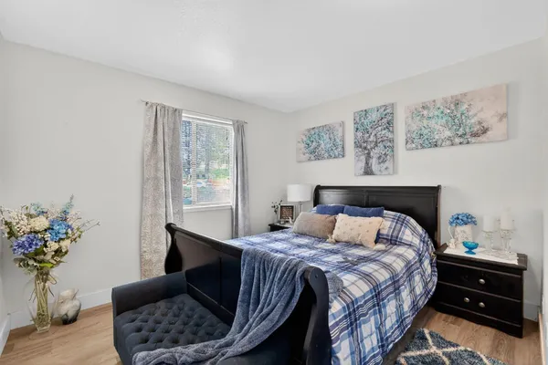 a view of a dining room with furniture and window