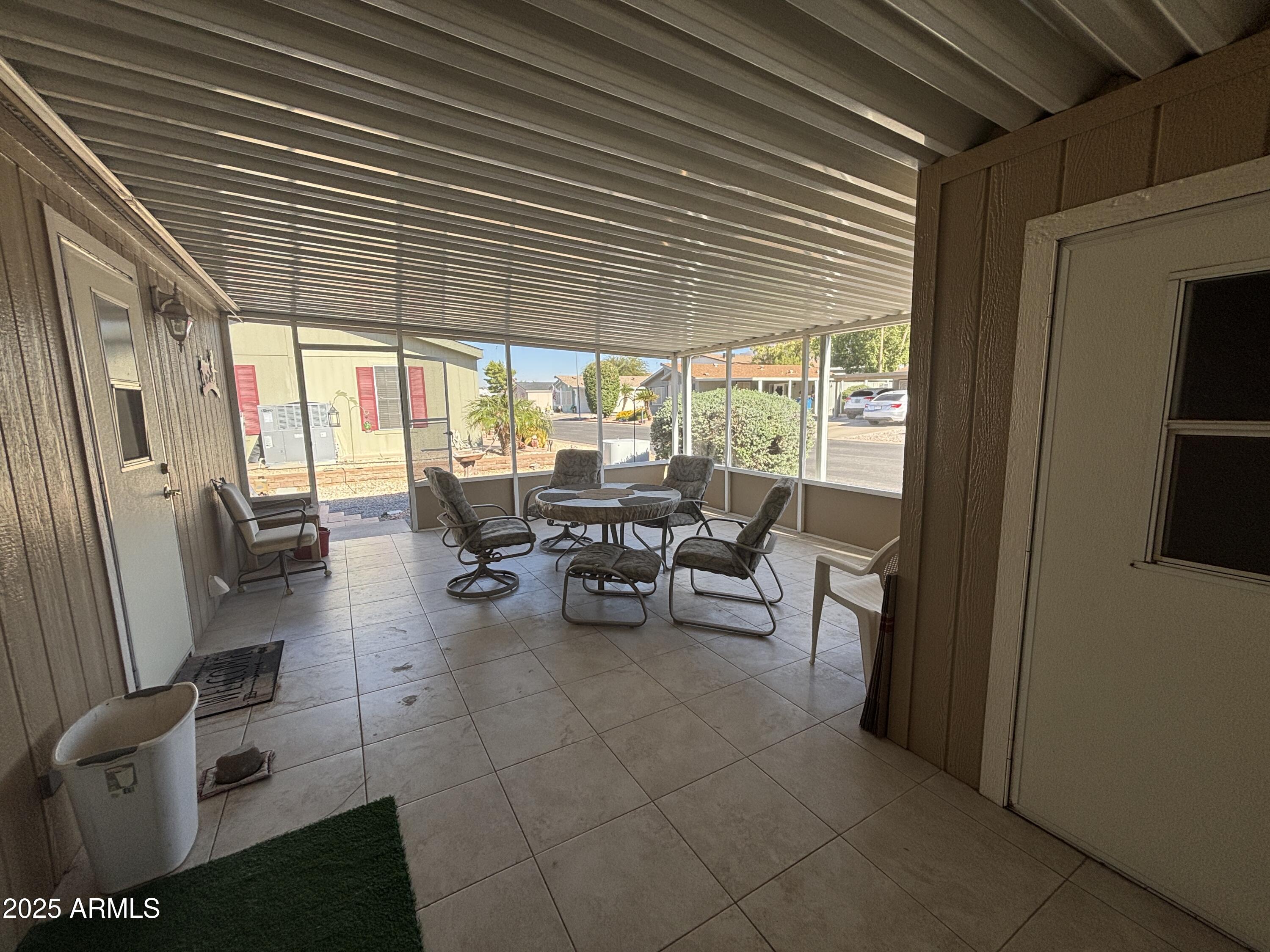 3355 South Cortez Road, Unit 28 Apache Junction, AZ 85119 - Photo 23 of 24 a view of a chairs and table in a balcony