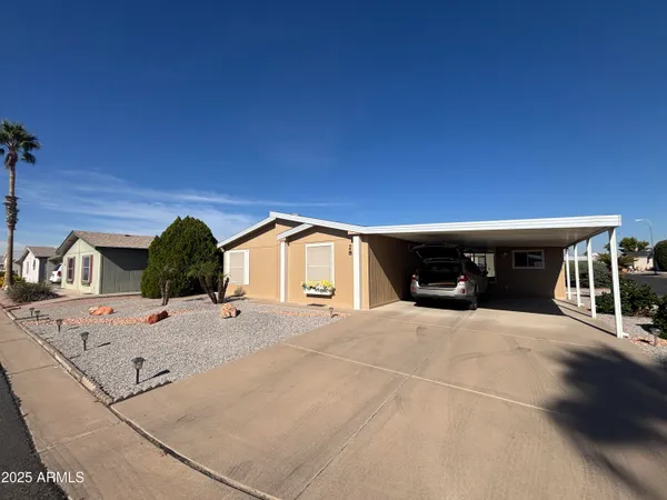 a view of a house with roof yard