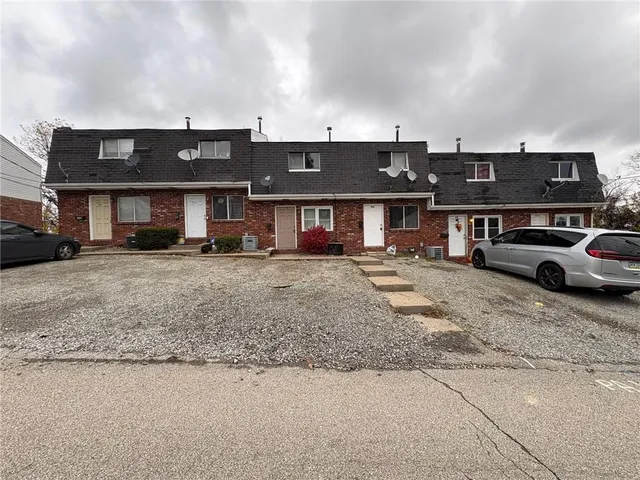 a view of a building with a street