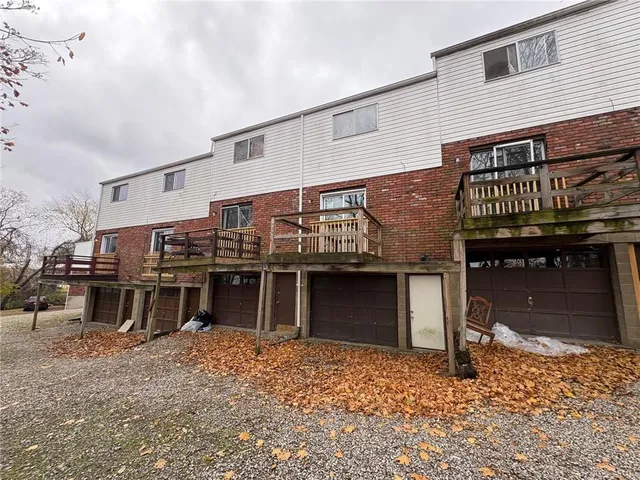 a front view of a house with a balcony