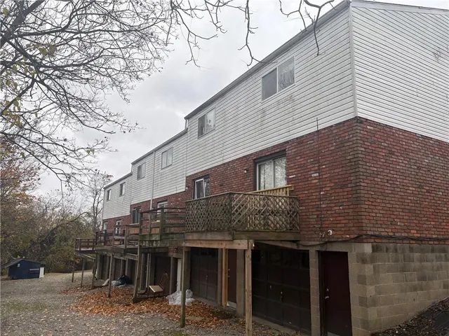 a front view of a house with balcony