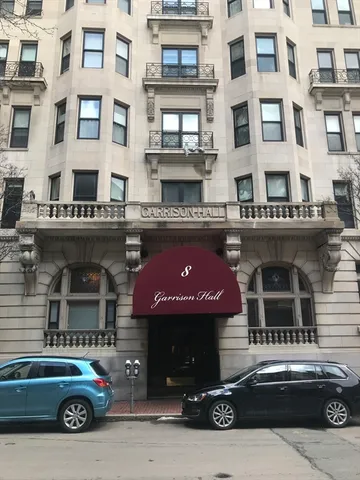 a front view of a building with glass windows