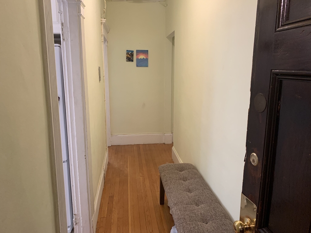 8 Garrison Street, Unit 511 Boston, MA 02116 - Photo 7 of 13 a bathroom with a sink and a mirror