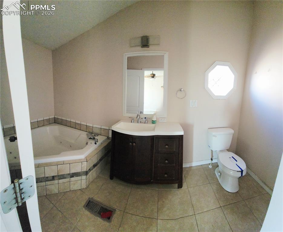 6760 Yoder Road Yoder, CO 80864 - Photo 11 of 23 a bathroom with a sink and a mirror