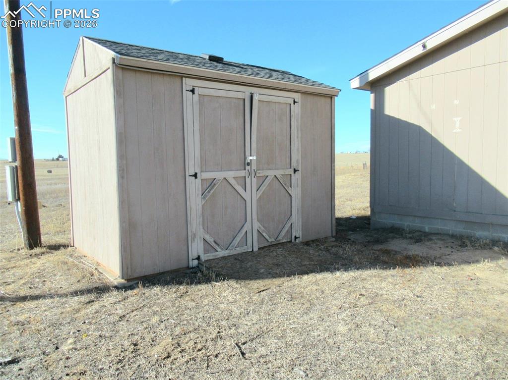 6760 Yoder Road Yoder, CO 80864 - Photo 17 of 23 a view of a garage