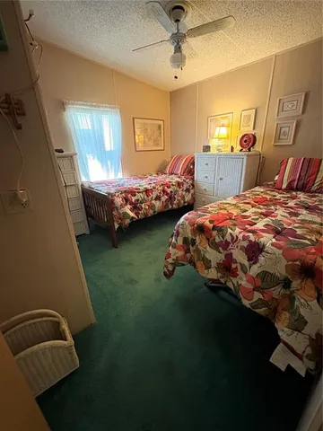 a bedroom with a bed and a closet