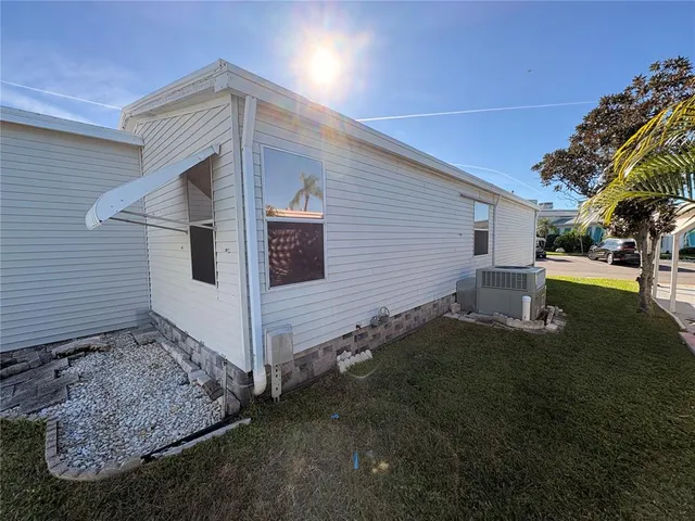 a view of a back yard of the house