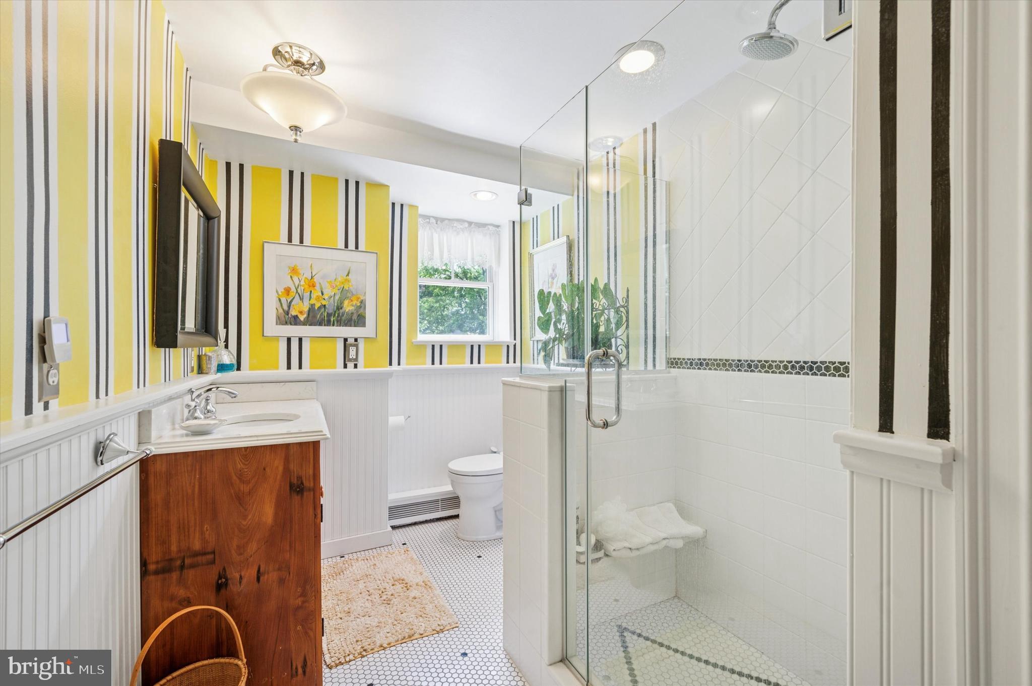 119 Francis Avenue Wayne, PA 19087 - Photo 16 of 26 a bathroom with a sink a toilet and shower