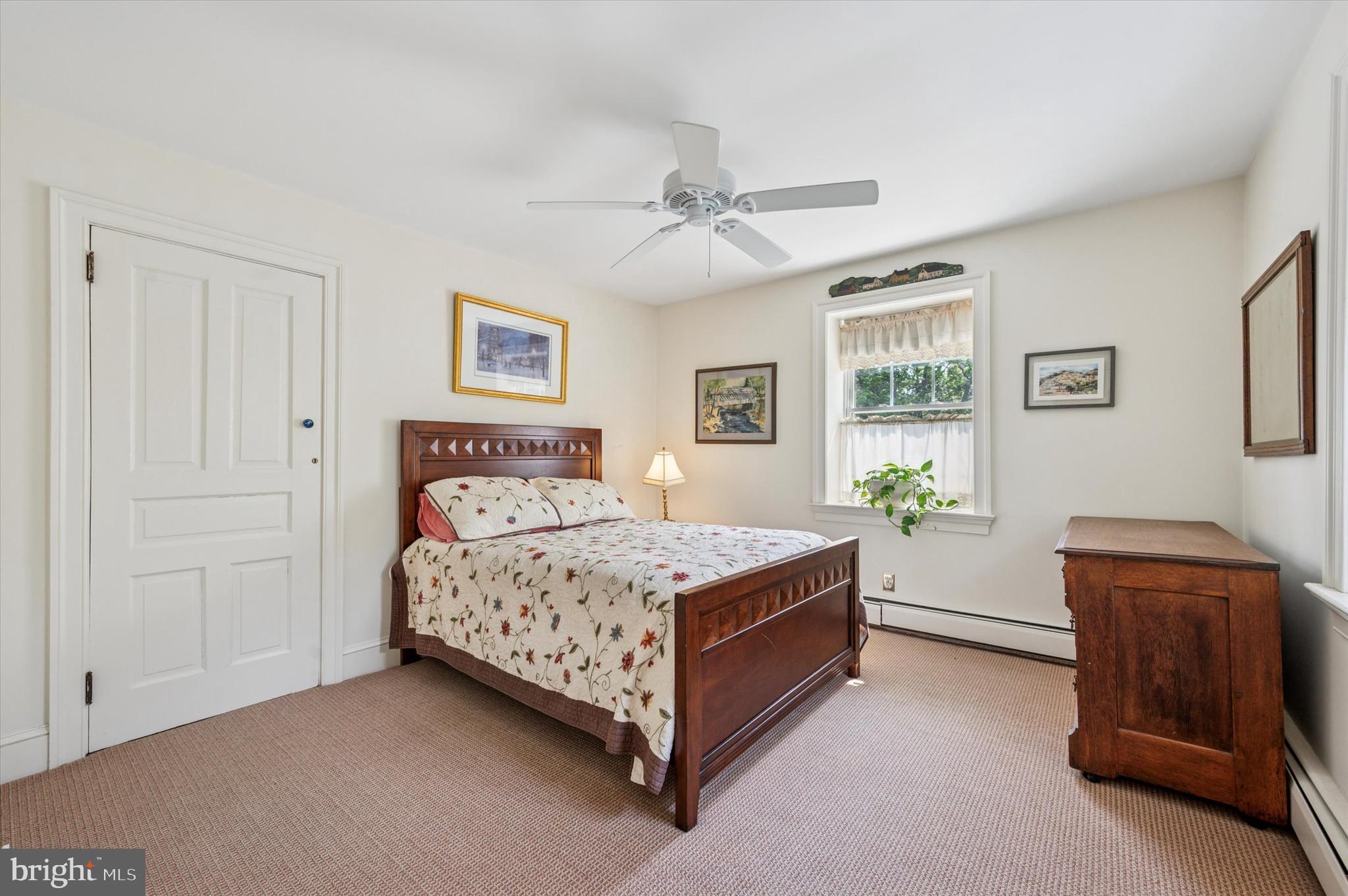 119 Francis Avenue Wayne, PA 19087 - Photo 18 of 26 a bedroom with a bed and a dresser