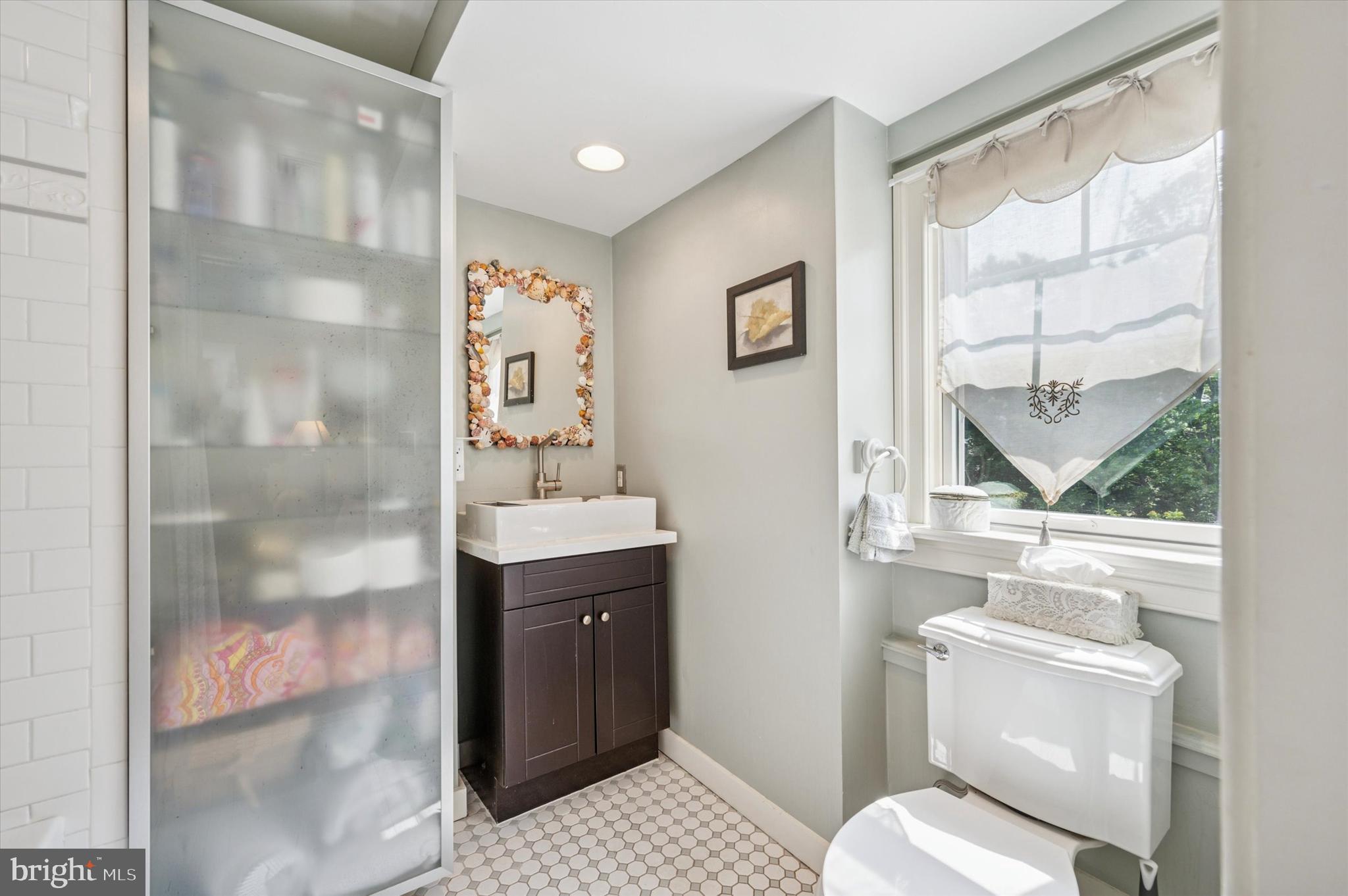 119 Francis Avenue Wayne, PA 19087 - Photo 20 of 26 a bathroom with a sink toilet and shower
