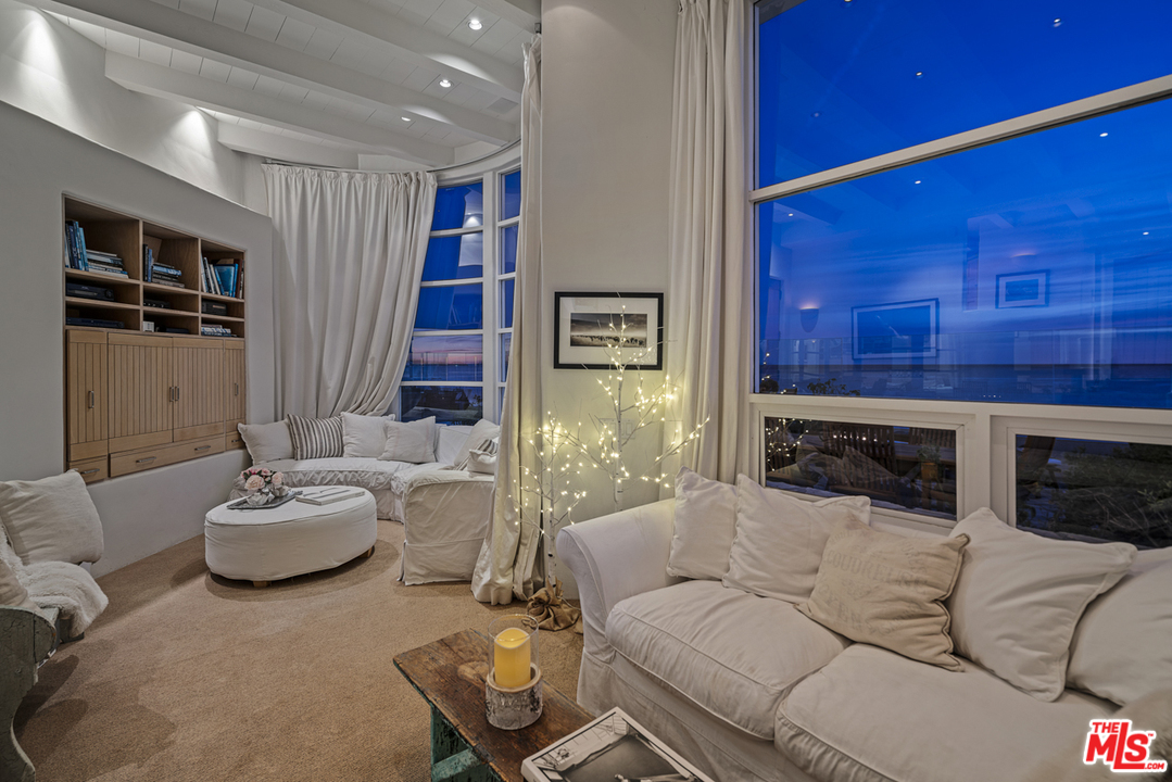 31725 Sea Level Drive Malibu, CA 90265 - Photo 34 of 37 a living room with furniture and a fireplace