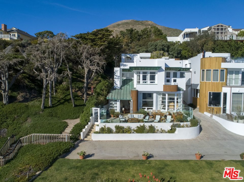 31725 Sea Level Drive Malibu, CA 90265 - Photo 35 of 37 a front view of a house with a garden