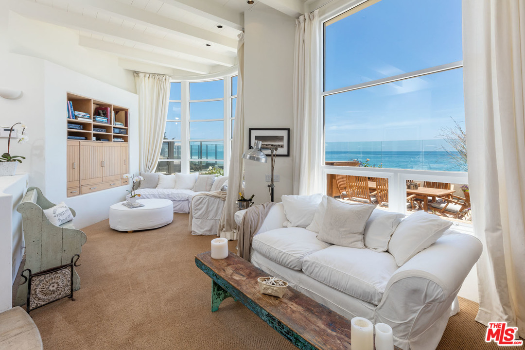 31725 Sea Level Drive Malibu, CA 90265 - Photo 5 of 37 a living room with furniture and a large window