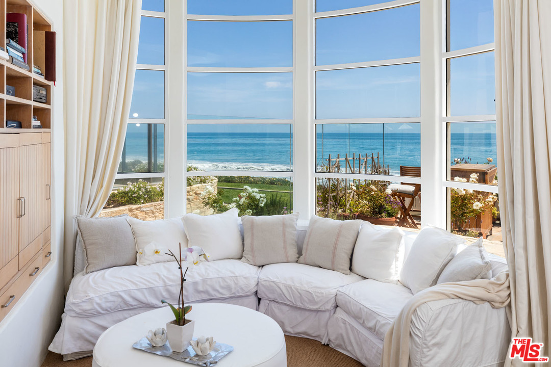 31725 Sea Level Drive Malibu, CA 90265 - Photo 6 of 37 a living room with furniture and a large window