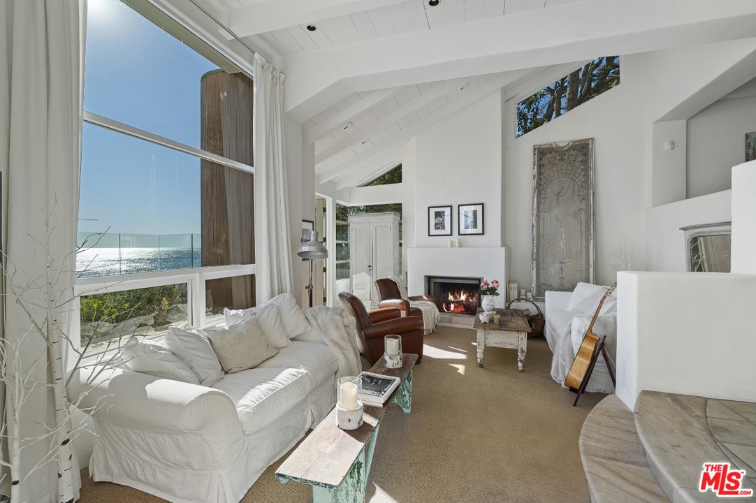 31725 Sea Level Drive Malibu, CA 90265 - Photo 7 of 37 a living room with furniture and a window