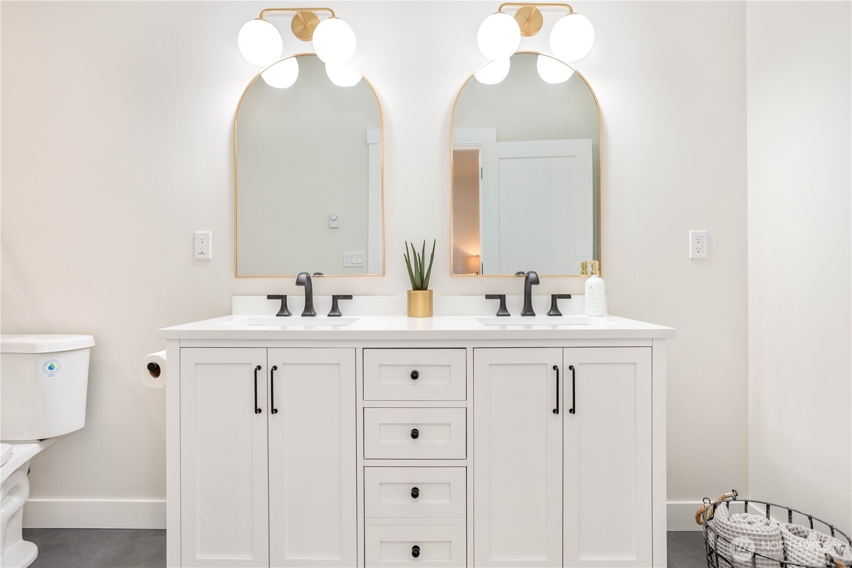 7933 Oregon Trail Maple Falls, WA 98266 - Photo 22 of 29 a bathroom with a sink vanity and a mirror