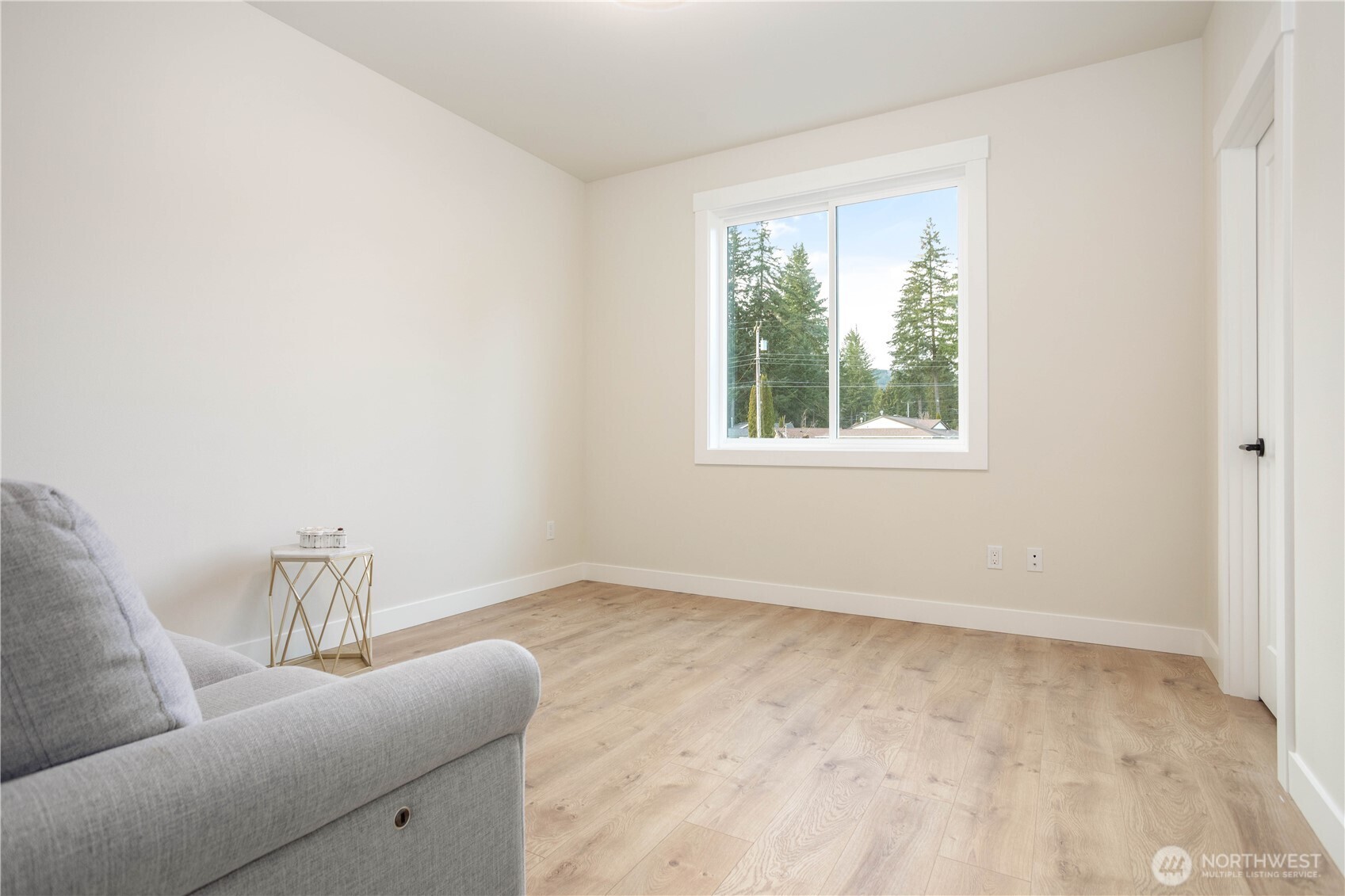 7933 Oregon Trail Maple Falls, WA 98266 - Photo 23 of 29 a living room with furniture and a window