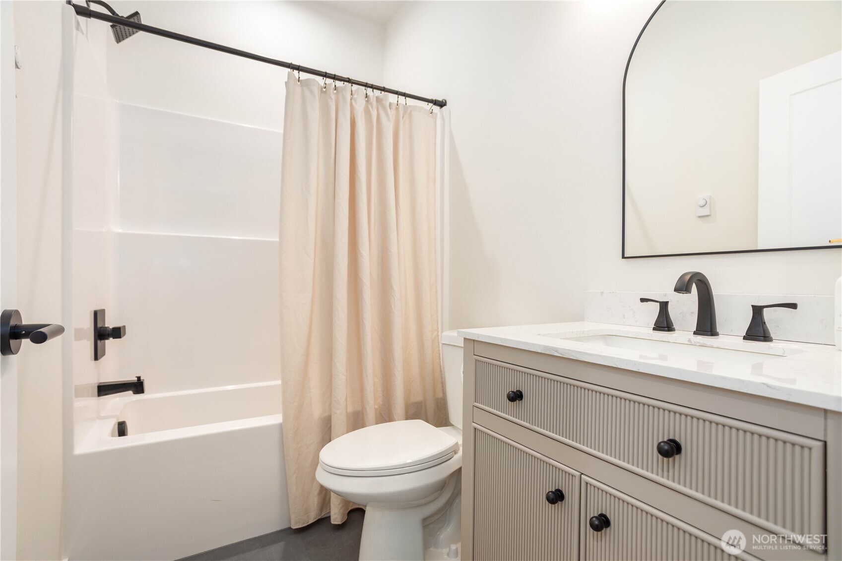 7933 Oregon Trail Maple Falls, WA 98266 - Photo 10 of 29 a bathroom with a sink a toilet and a bathtub