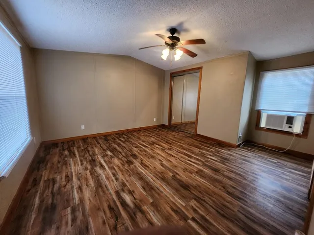a kitchen with a stove and a refrigerator