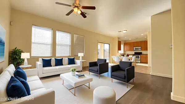 a living room with furniture and a large window