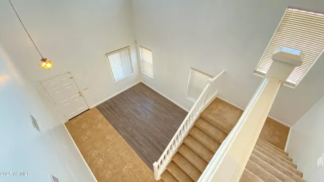 a view of a living room with furniture