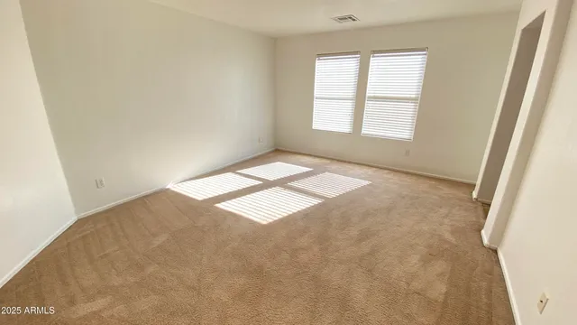 an empty room with windows