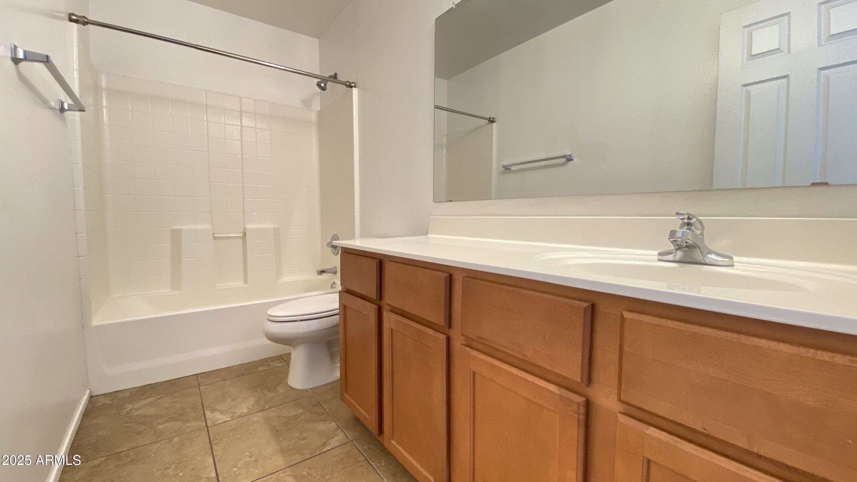 7425 West Crown King Road Phoenix, AZ 85043 - Photo 20 of 27 a bathroom with a sink a toilet and shower